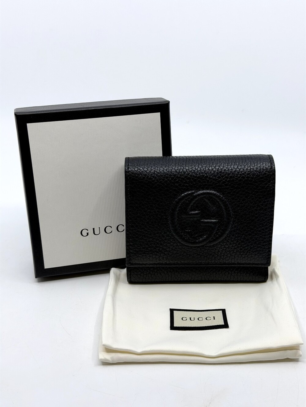 Gucci Soho Interlocking GG leather compact tri-fold wallet